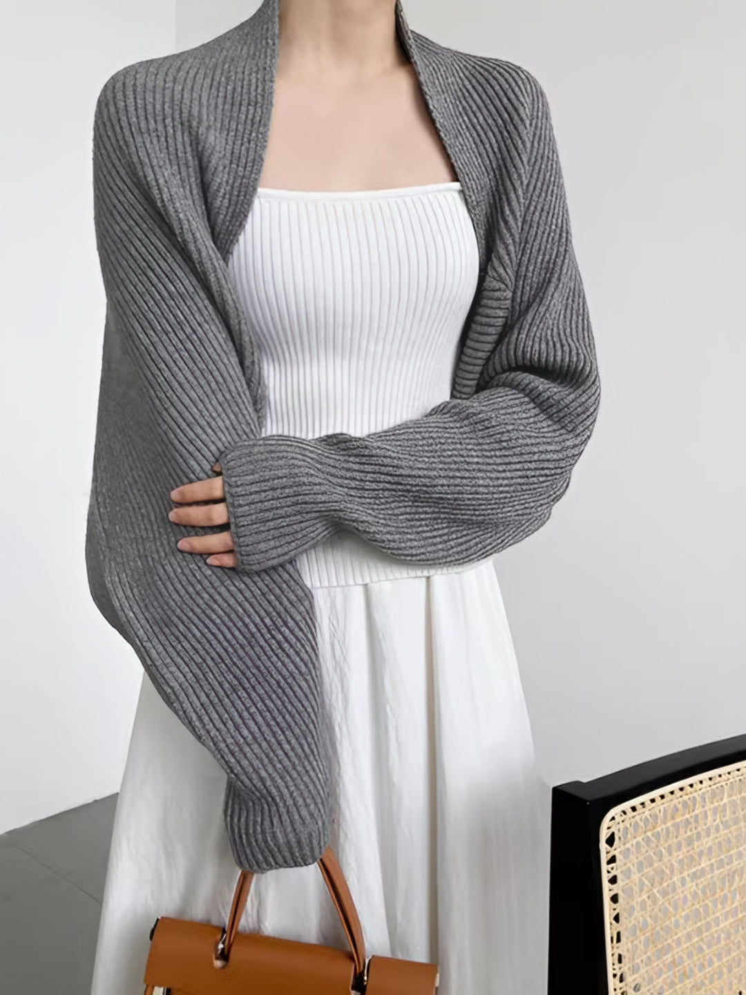 Front view of open-front neckline and ribbed cuffs, gray