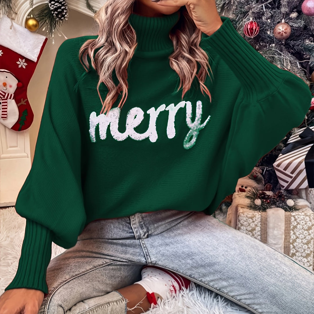 Front view showing turtleneck and graphic front, dark green