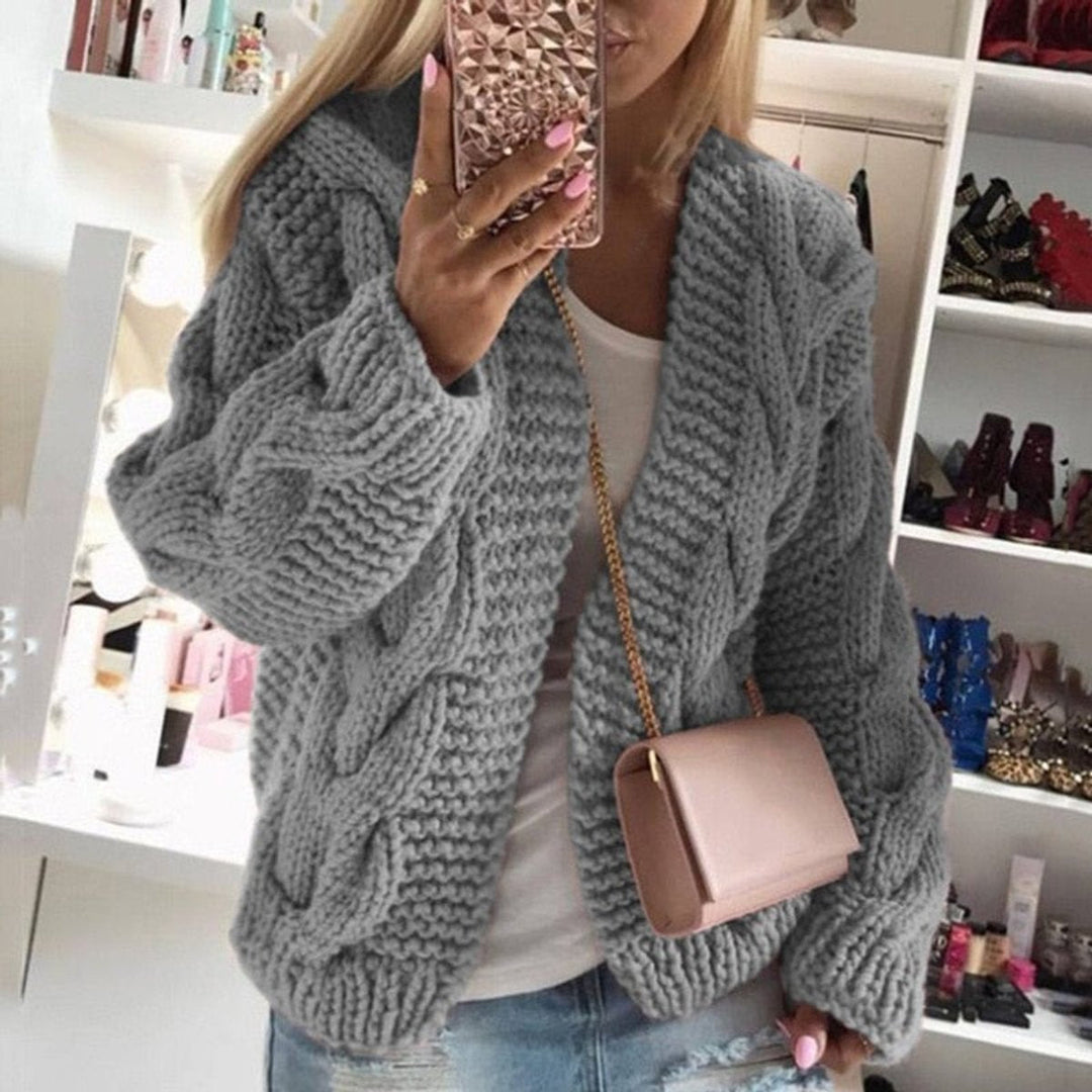 Front view of open front cardigan with cable knit sleeves, gray