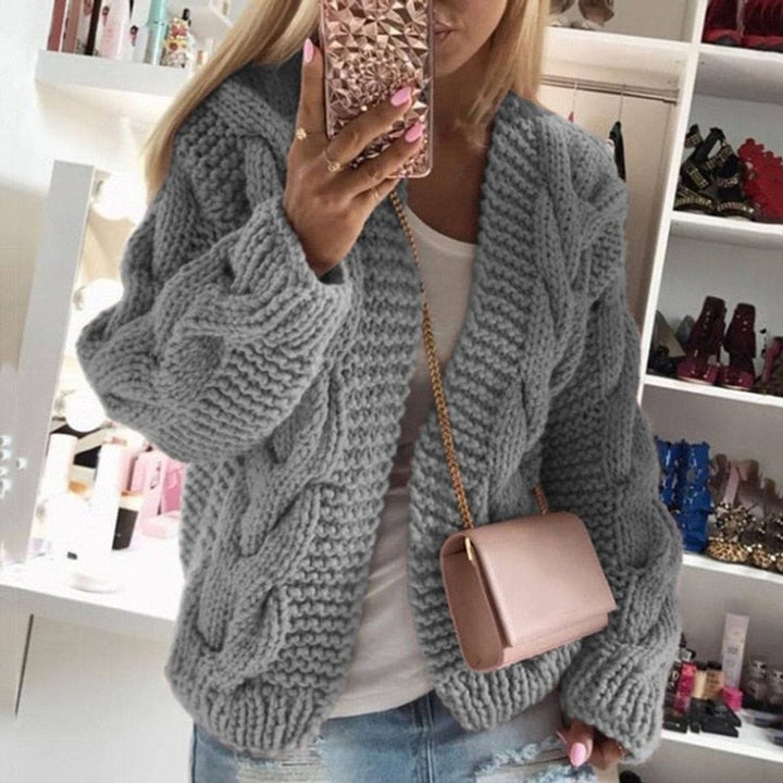 Front view of open front cardigan with cable knit sleeves, gray