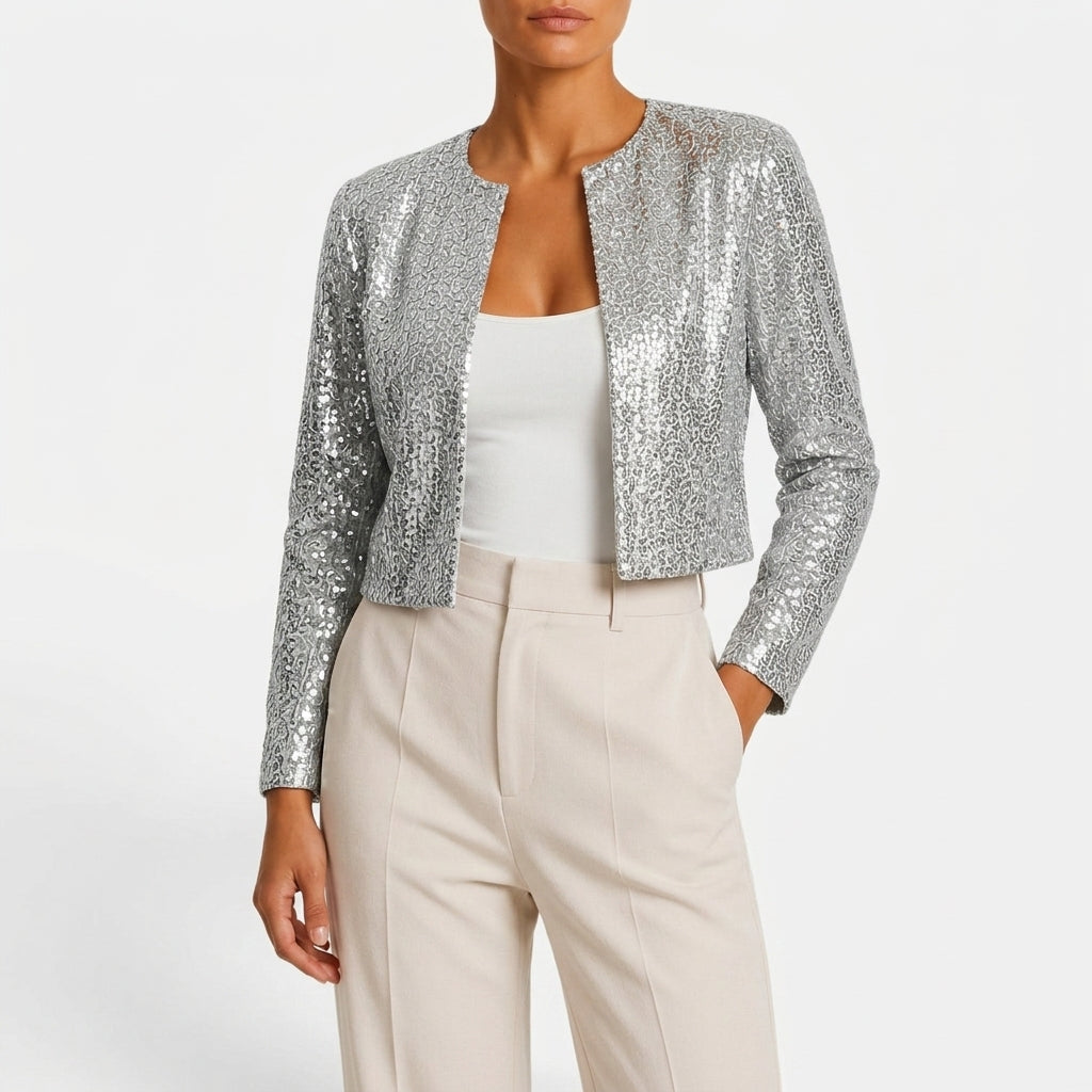 Front view showing round neckline, open front and long sleeves, silver