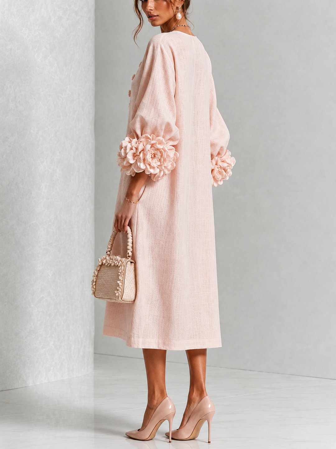 Back view of the dress with floral cuffs