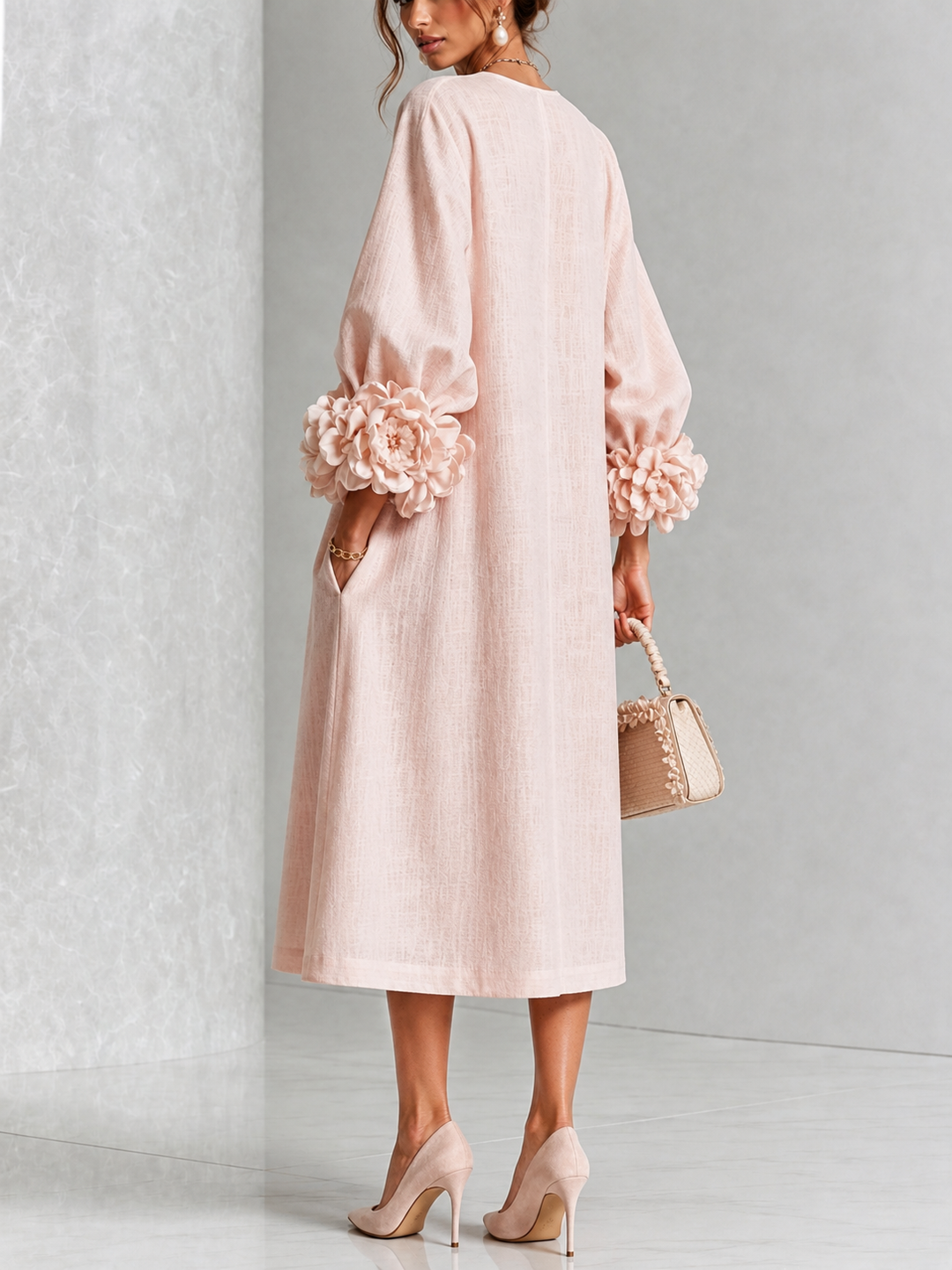Back view showing floral cuffs and side pocket
