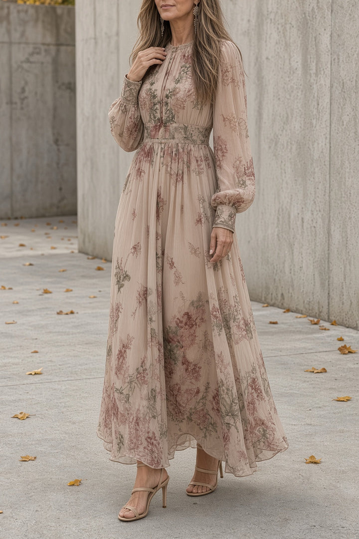 Front view showing round neckline, banded cuffs, banded waist and pleated skirt