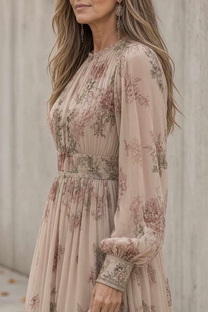 Side view showing gathered neckline, long sleeve, banded cuff and banded waist