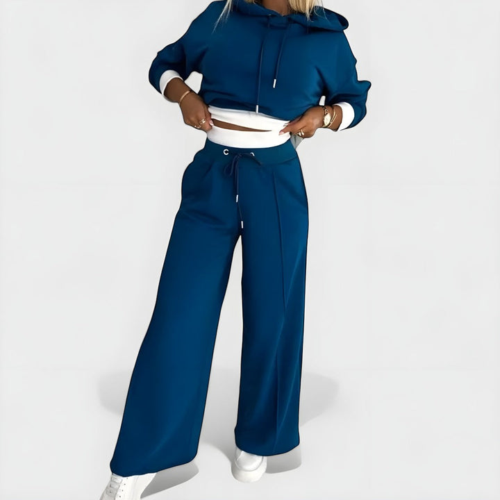 Front view of cropped hooded top with banded cuffs and wide legs