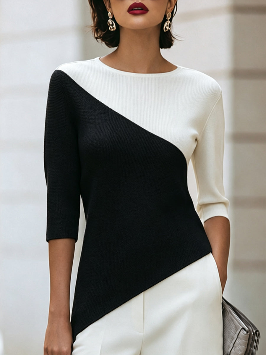 Front view of round neckline, three-quarter sleeves and color-block panels, black