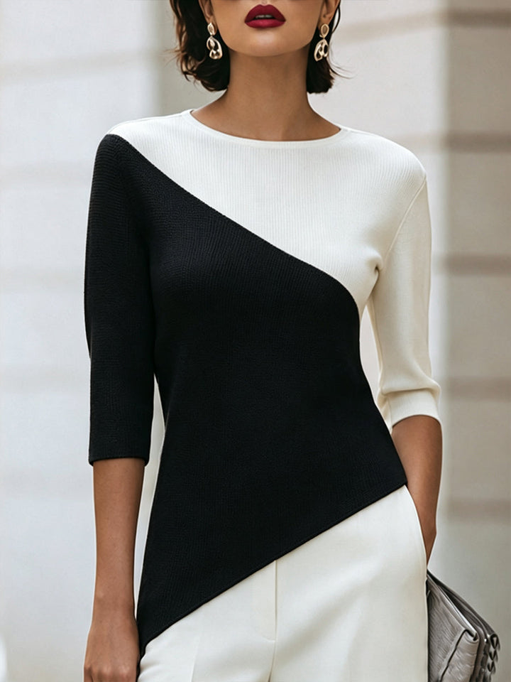 Front view of round neckline, three-quarter sleeves and color-block panels, black
