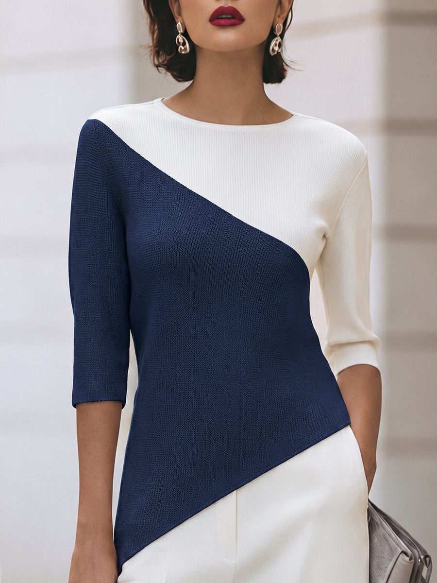 Front view of round neckline, three-quarter sleeves and color-block panels, navy blue
