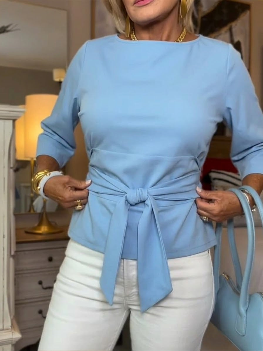 Front view of banded waist and bow front, lightblue