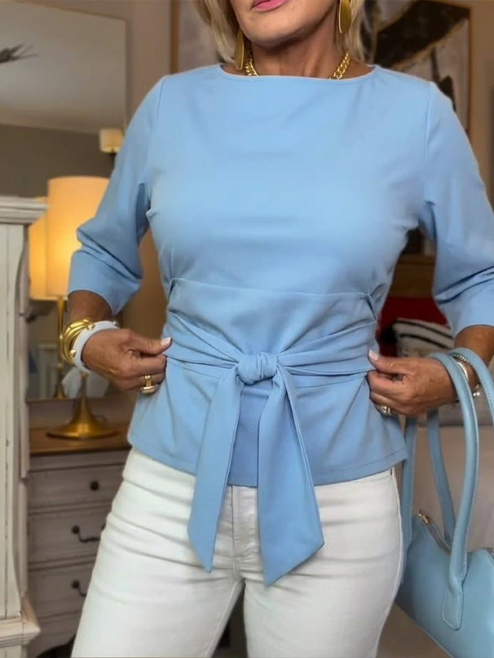 Front view of banded waist and bow front, lightblue