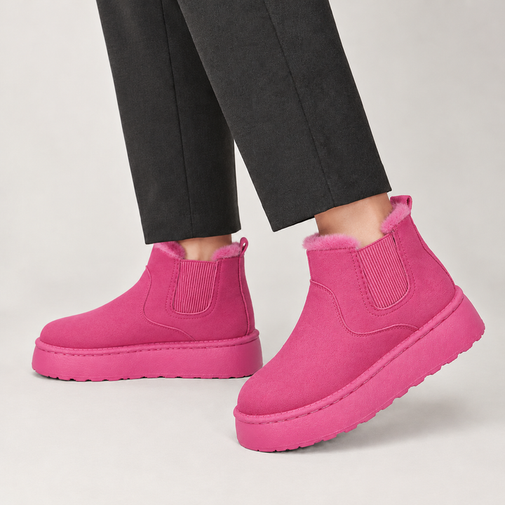 Side view of the upper, fleece lined collar and platform sole, rose red