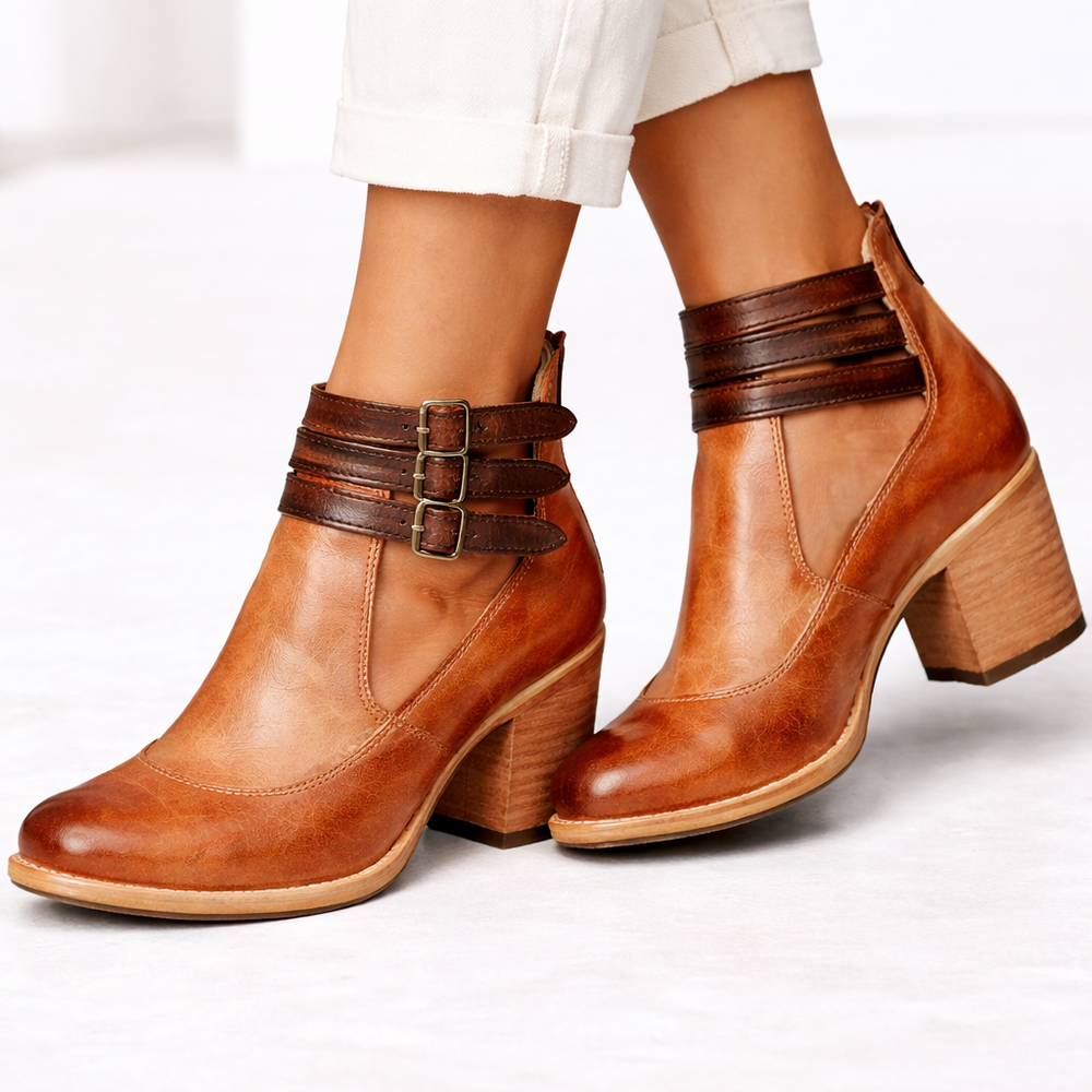 Front view of rounded toe upper with triple ankle straps and block heel, brown