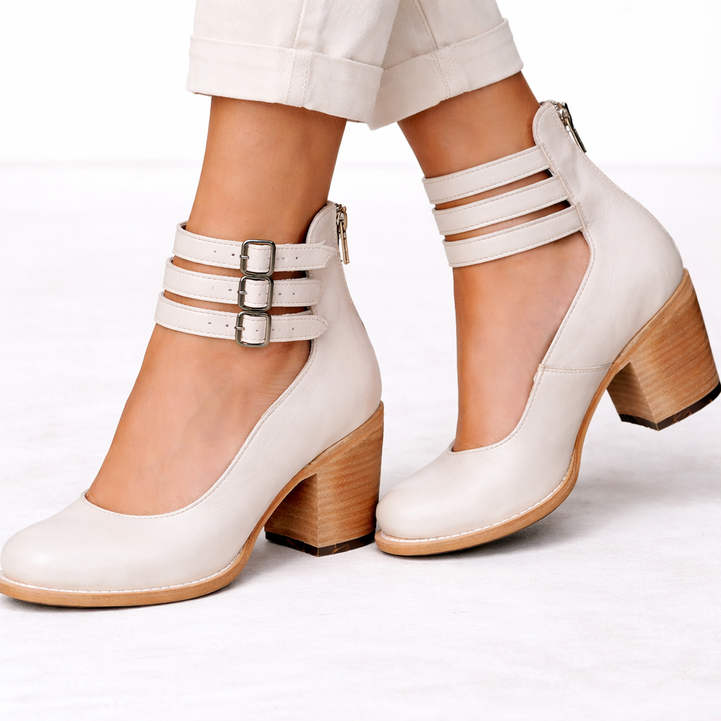 Front view of triple ankle straps with buckles and back zipper, white