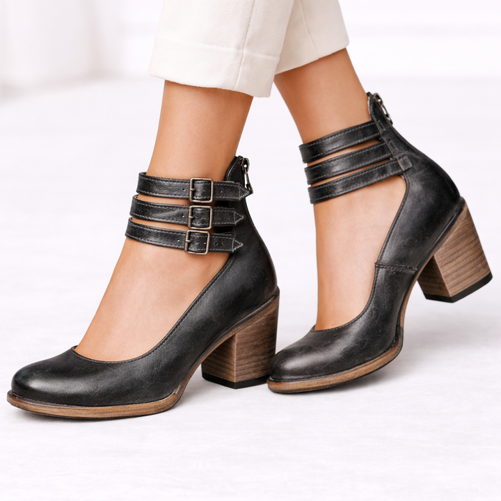 Front view of rounded toe upper with triple ankle straps and block heel, black