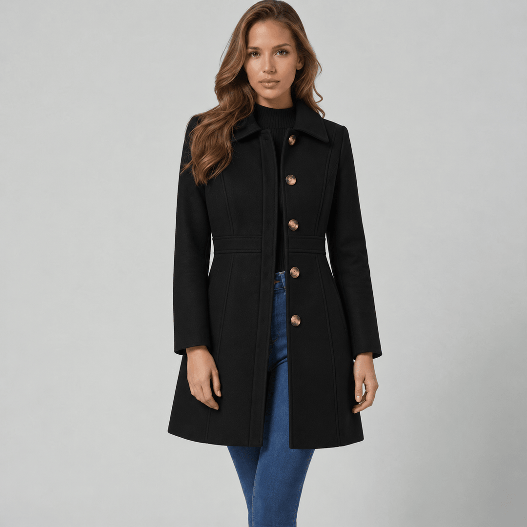 Front view showing shirt collar, button placket and long sleeves, black