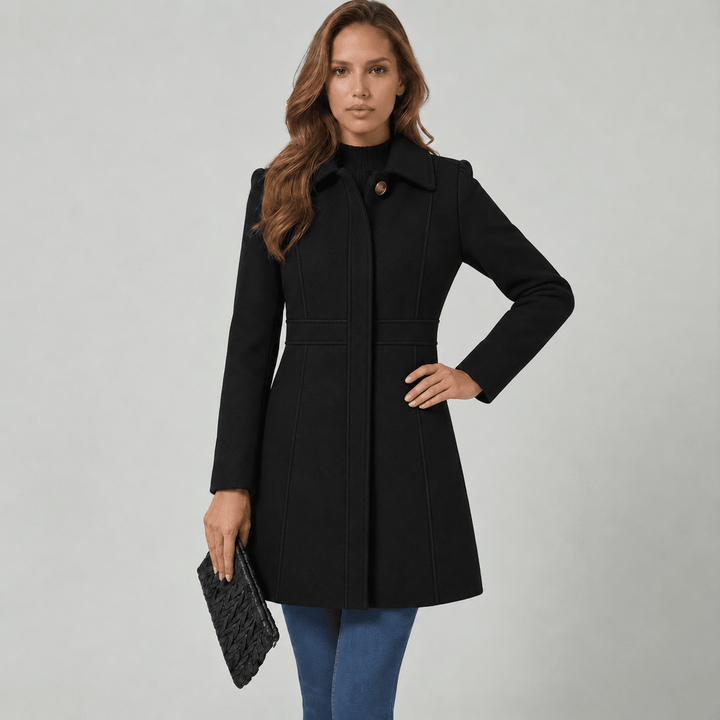 Side view showing long sleeves, banded waist and front panels
