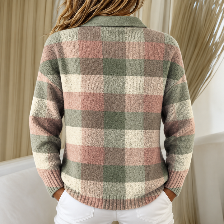 Back view showing shirt collar, long sleeves and banded hem