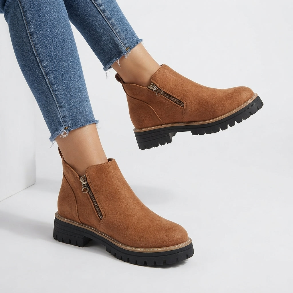 Inner side zip fastening on ankle boot