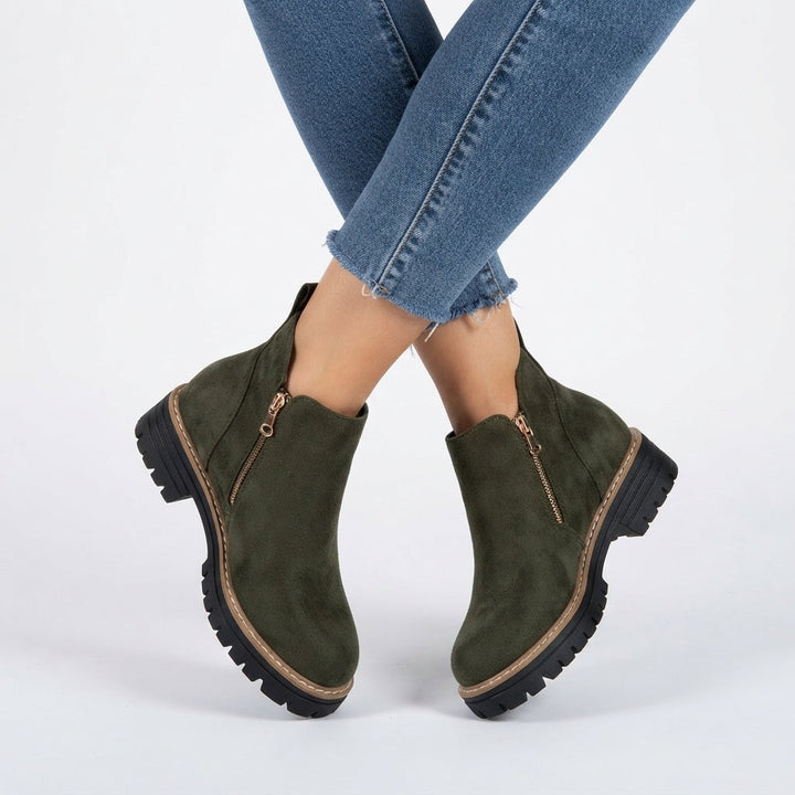 Pair of ankle boots angled together