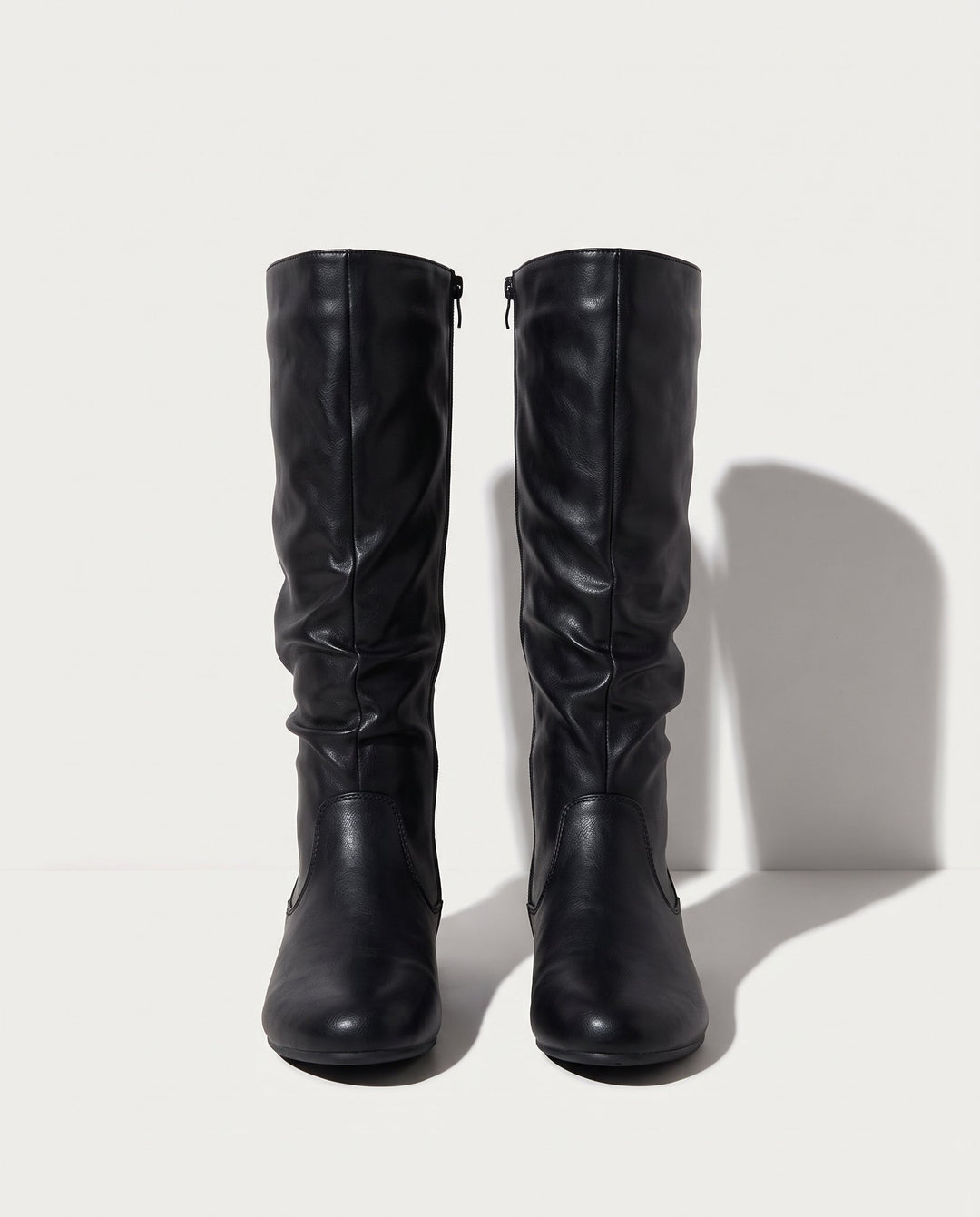 Slouchy flat knee high boots front view