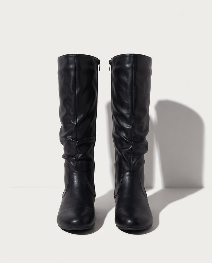 Slouchy flat knee high boots front view