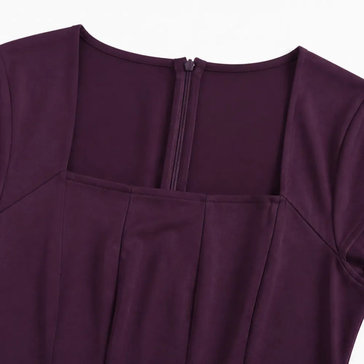 Detail view of square neckline and back zipper