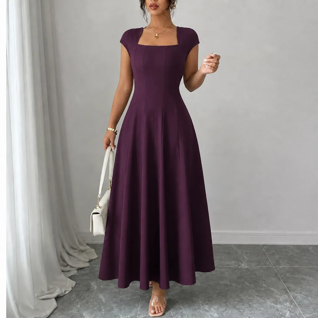 Front view showing square neckline, cap sleeves and skirt, burgundy