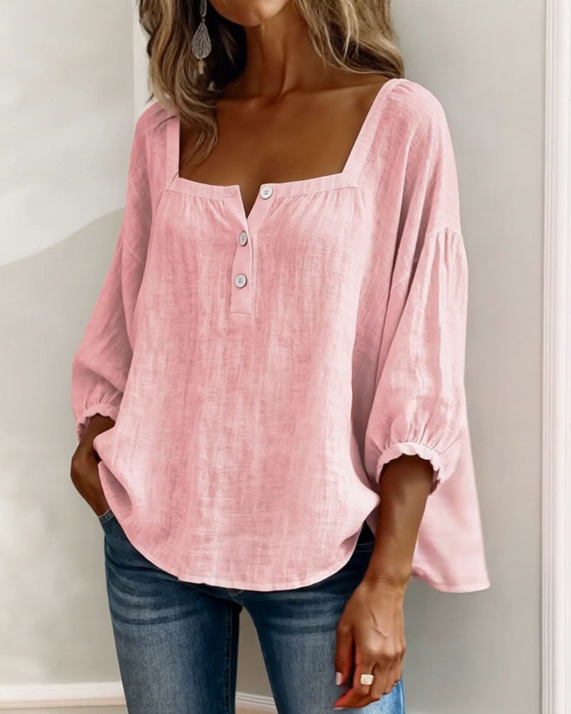 Front view of square neckline and gathered cuffs