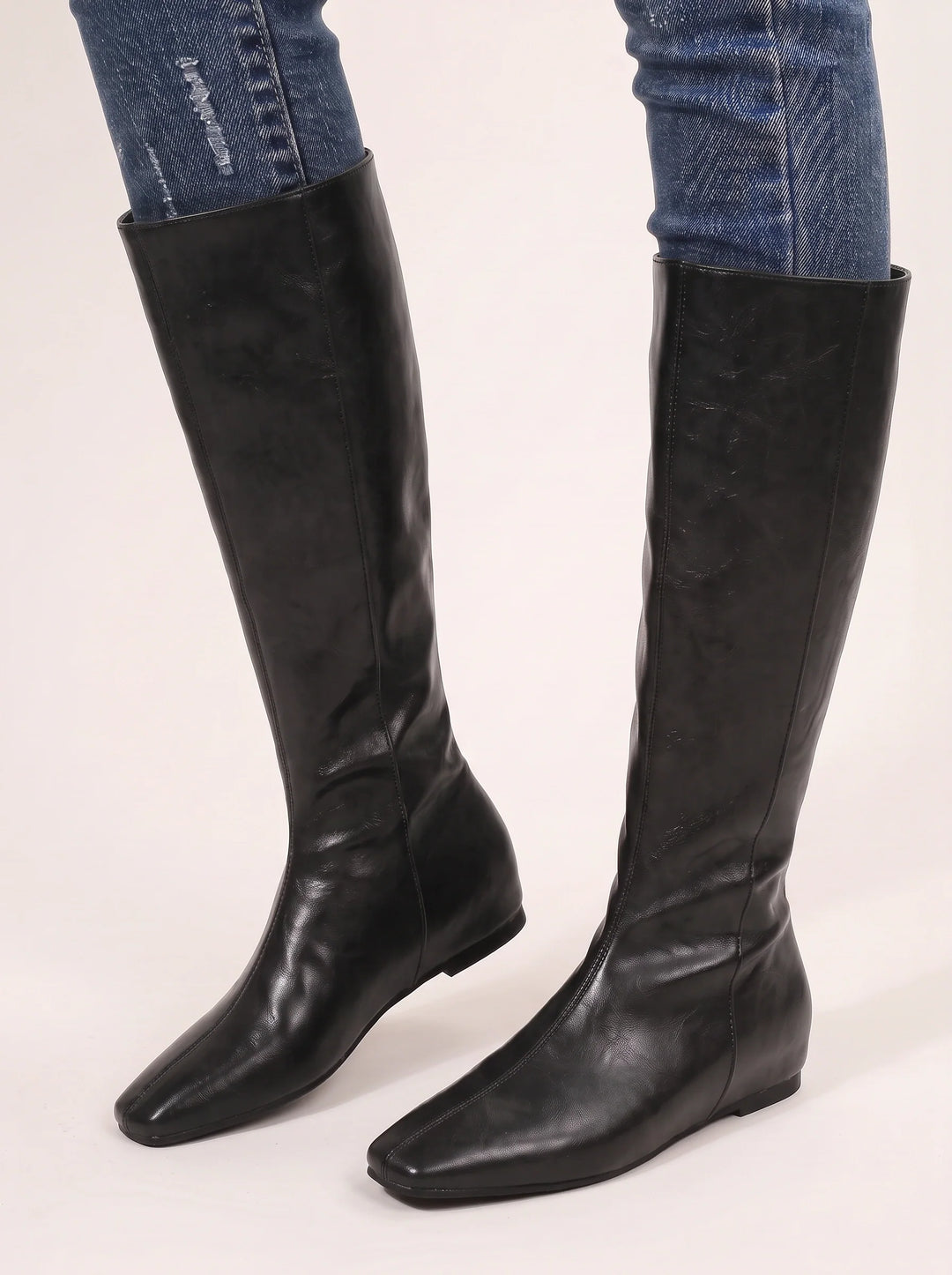 Side view of the upper and square toe, black