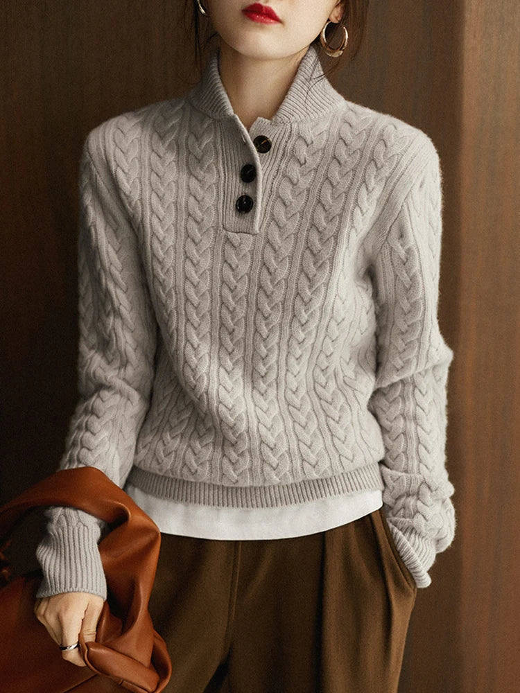 Front view of stand collar and cable-knit bodice, gray