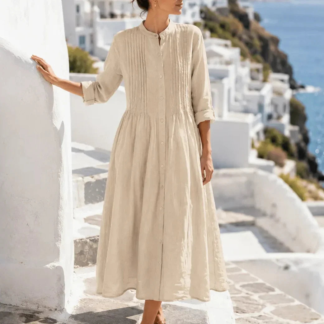 Side view of pintuck bodice, button placket and banded cuffs, khaki