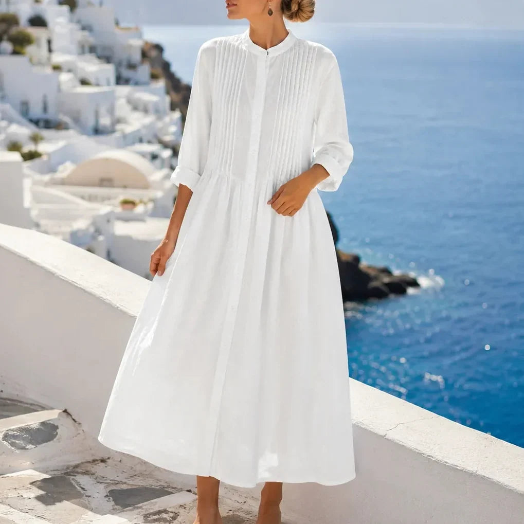 Side view of stand collar, pintuck bodice and gathered skirt, white