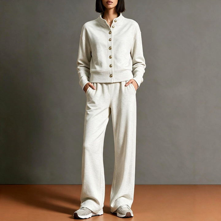 Front view showing stand collar, button placket and wide leg pants, beige