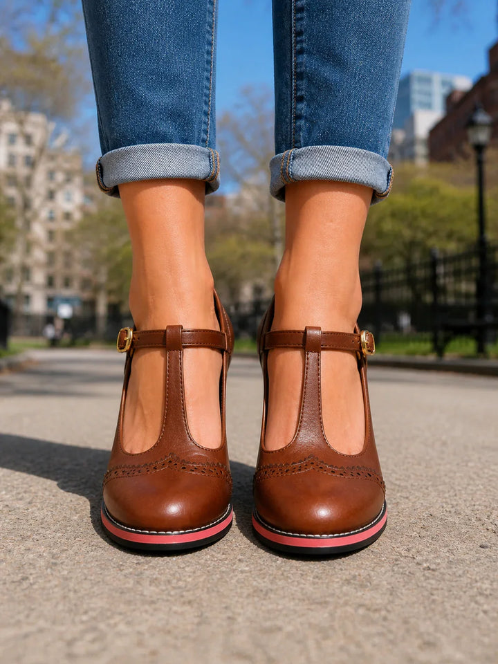 Front view of t-bar strap, buckle and brogue toe