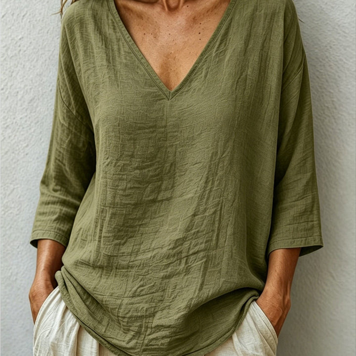 Front view showing v-neckline and dropped shoulder seams, fern green