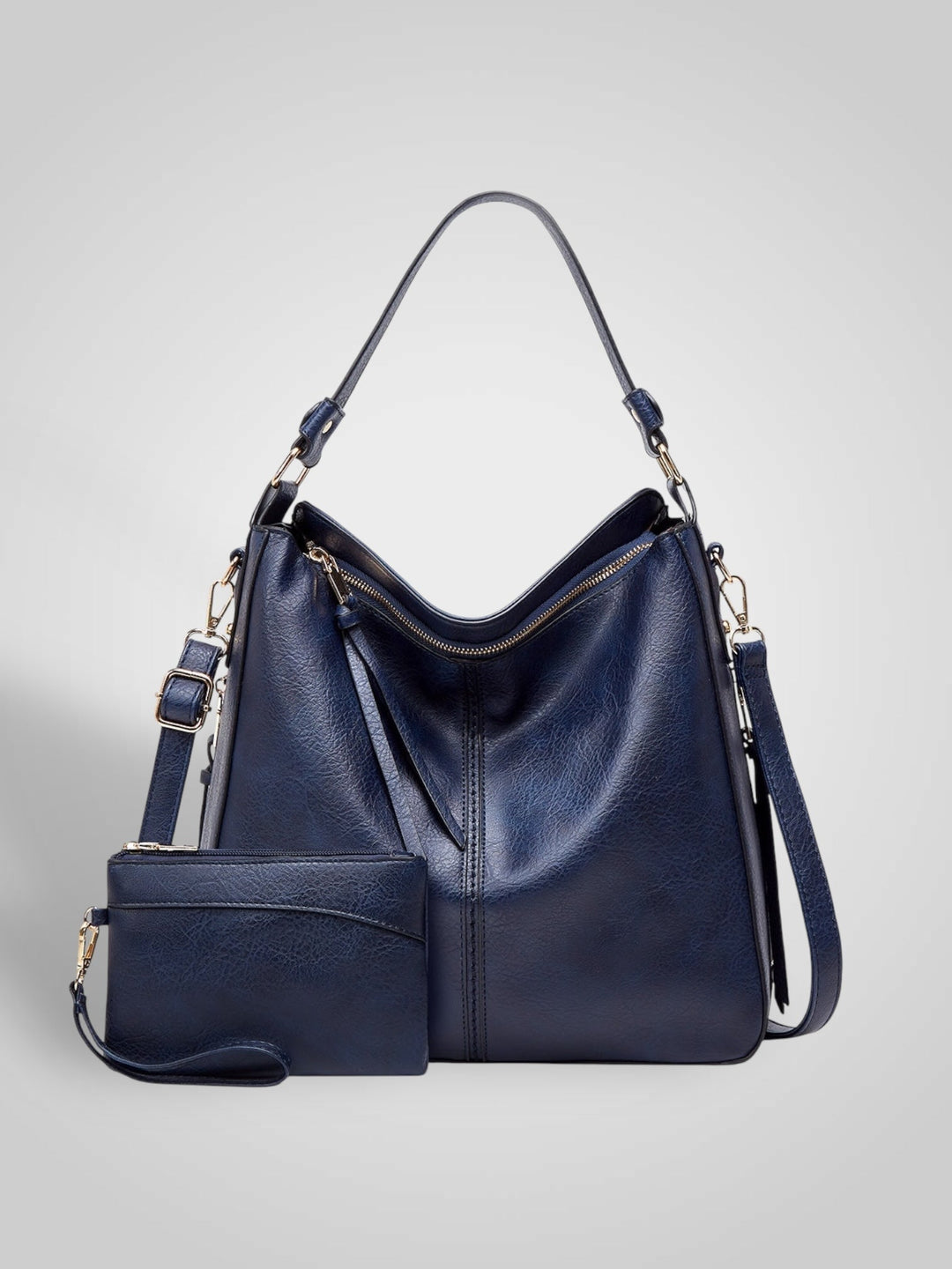 Front view with top handle, crossbody strap, top zipper closure and matching pouch, blue