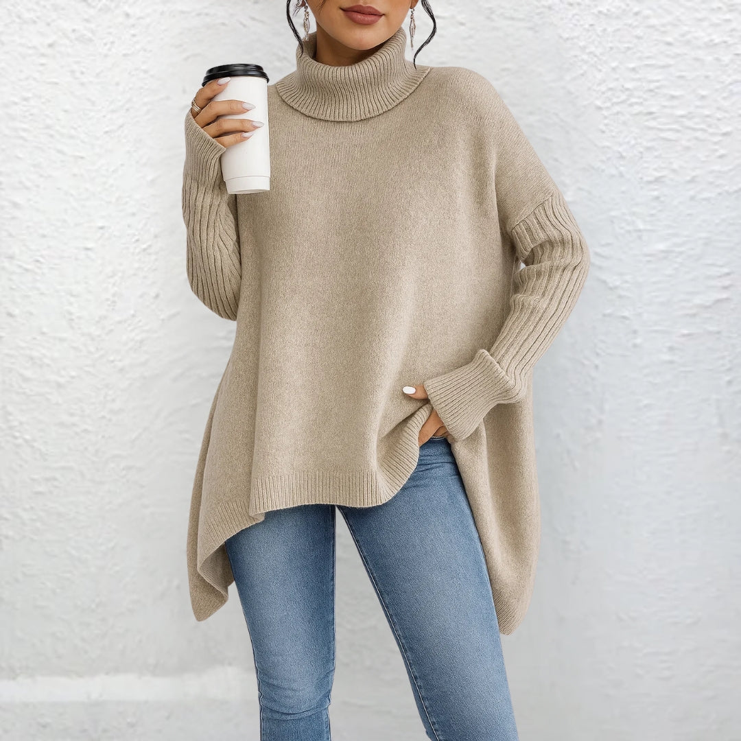Front view showing turtleneck and ribbed sleeves, beige