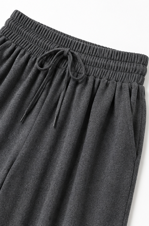 Close-up detail of banded waist with drawstring tie