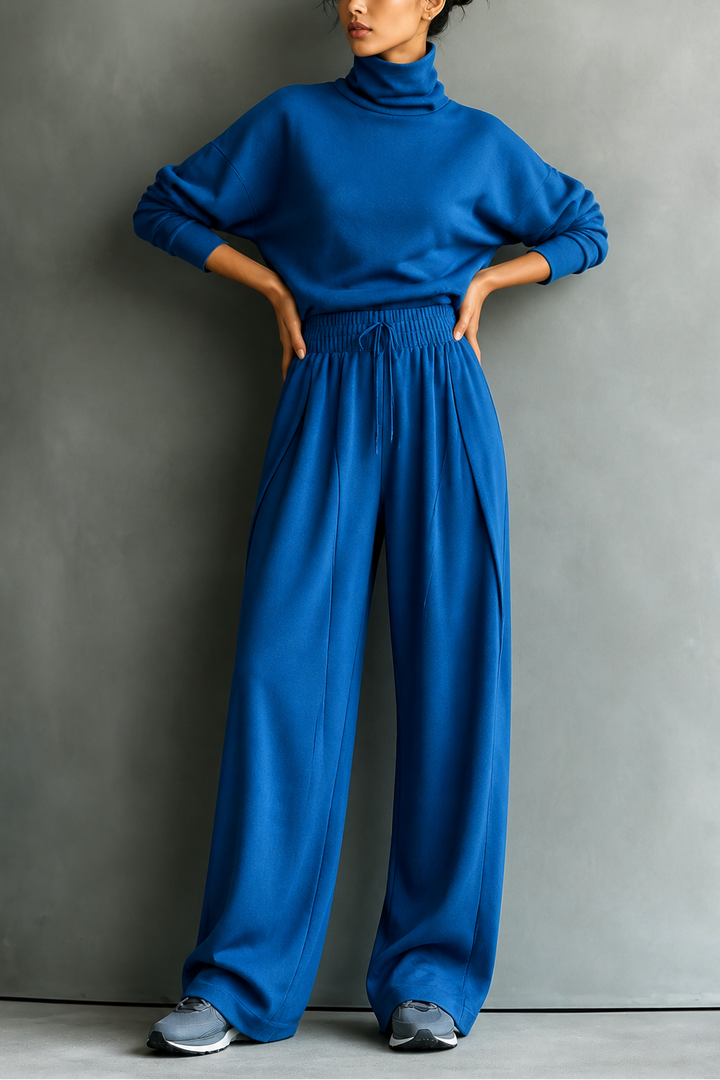 Front view with long sleeves, banded waist and wide legs, blue