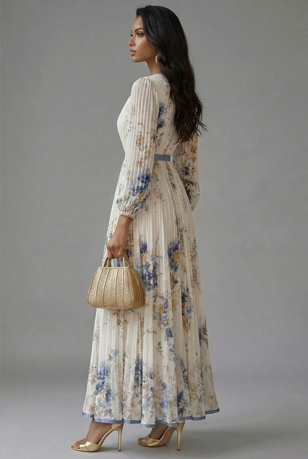 Back view of pleated bodice, banded waist and pleated skirt