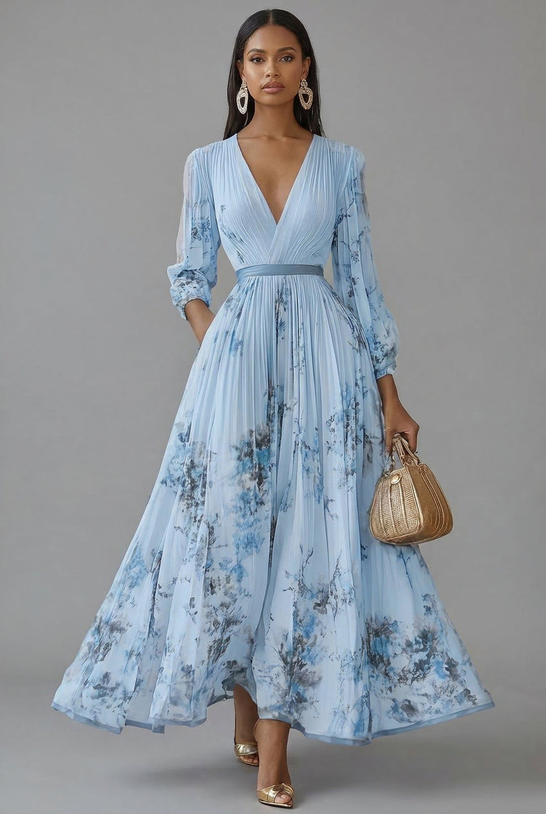 Front view of v-neckline, long sleeves and pleated skirt, blue