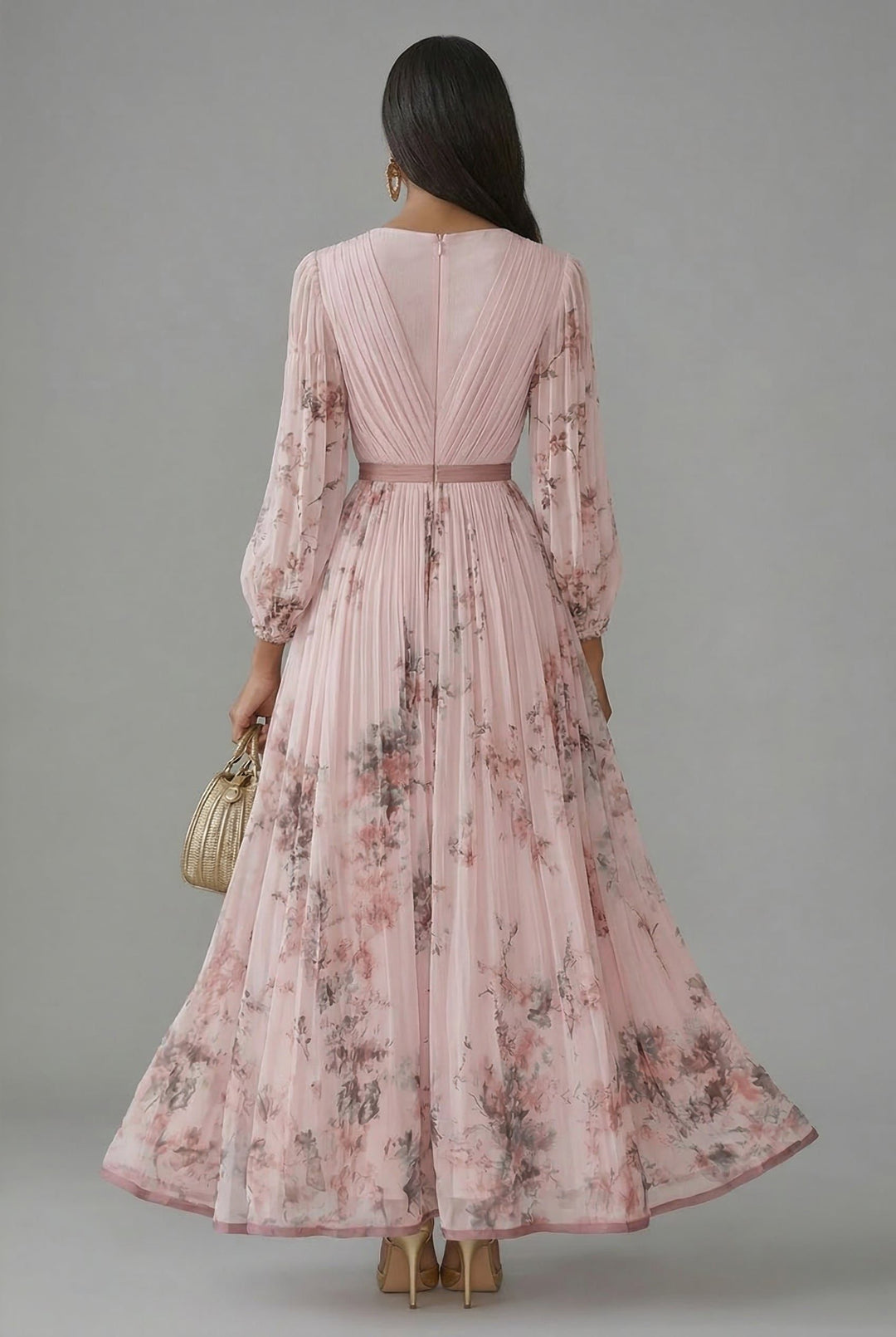 Back view of back zipper, banded waist and pleated skirt
