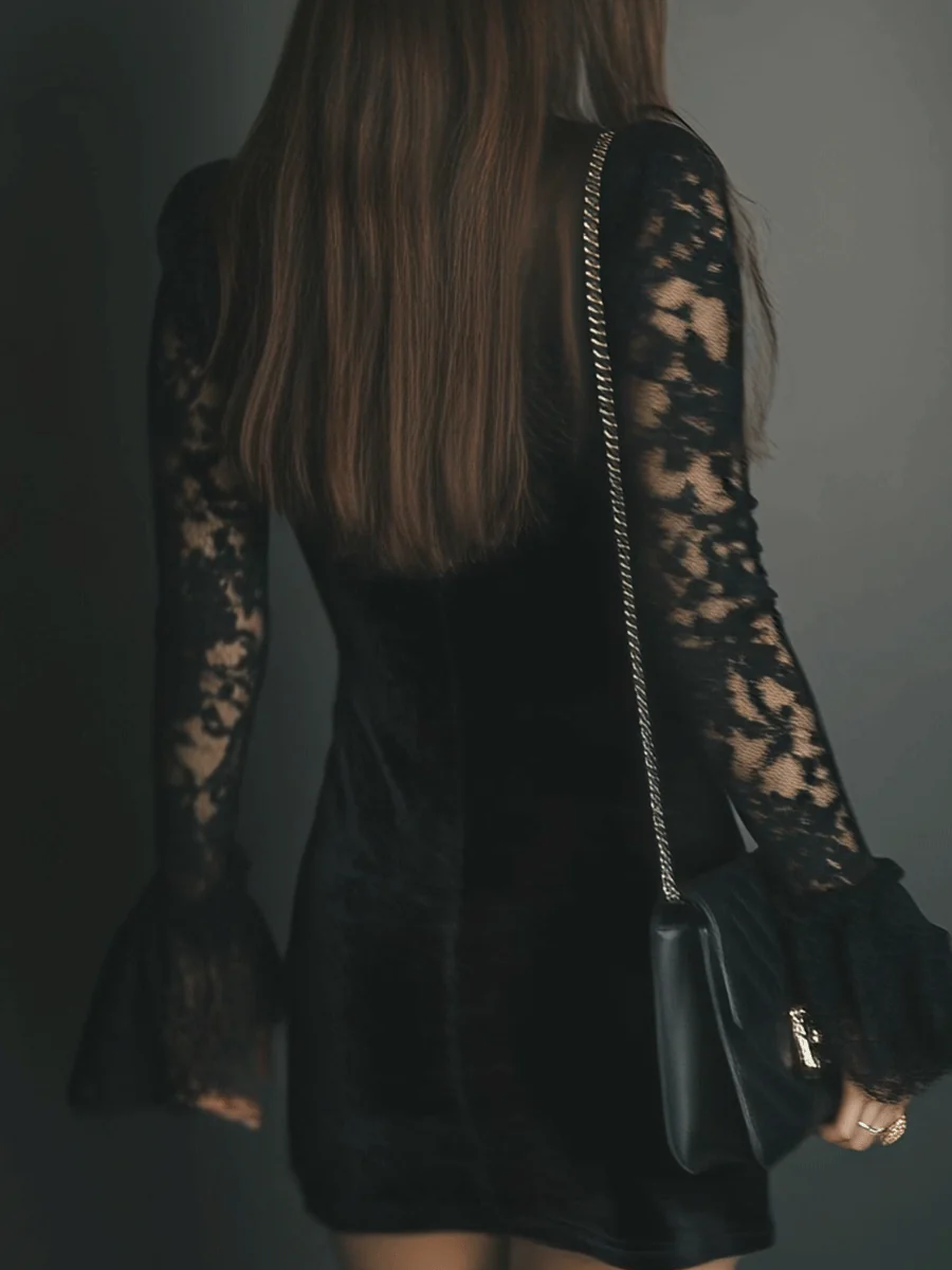 Back view showing lace sleeves and ruched skirt