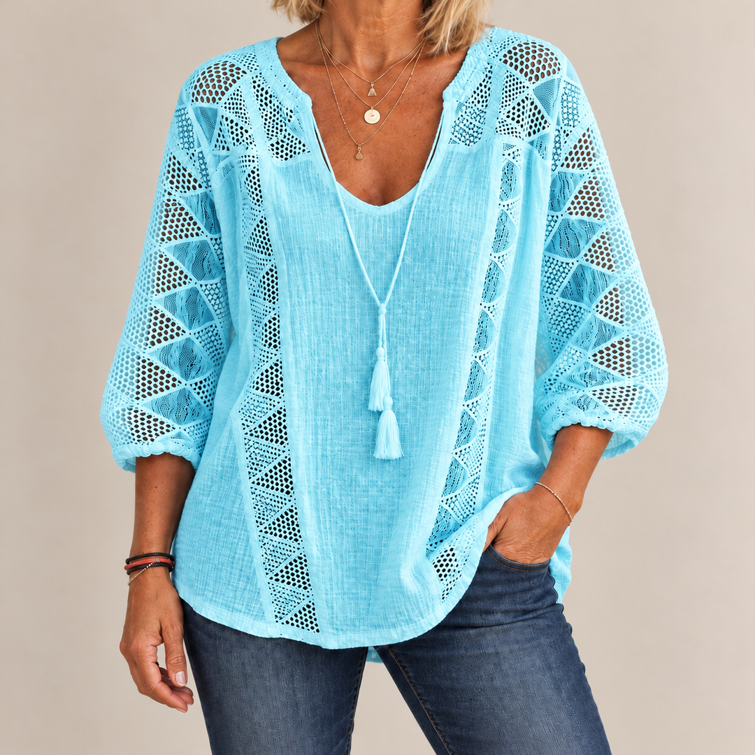 Front view of crochet sleeve panels and banded cuffs, light blue