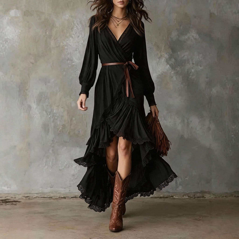 Front view showing v-neckline, wrap bodice, waist tie and tiered ruffle skirt, black