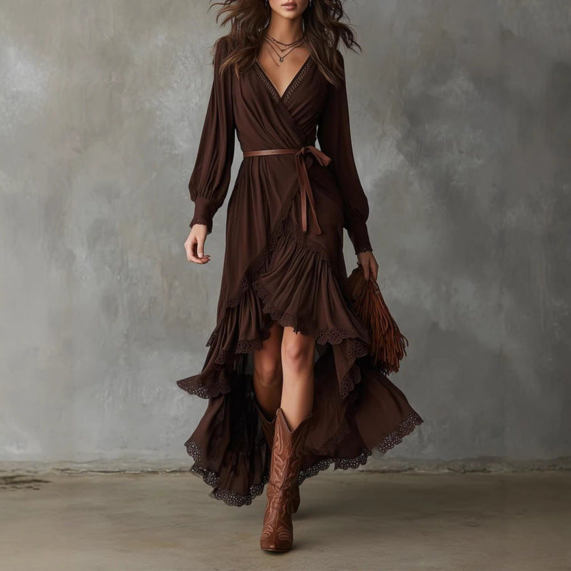 Front view showing v-neckline, long sleeves, waist tie and high-low ruffle hem, brown
