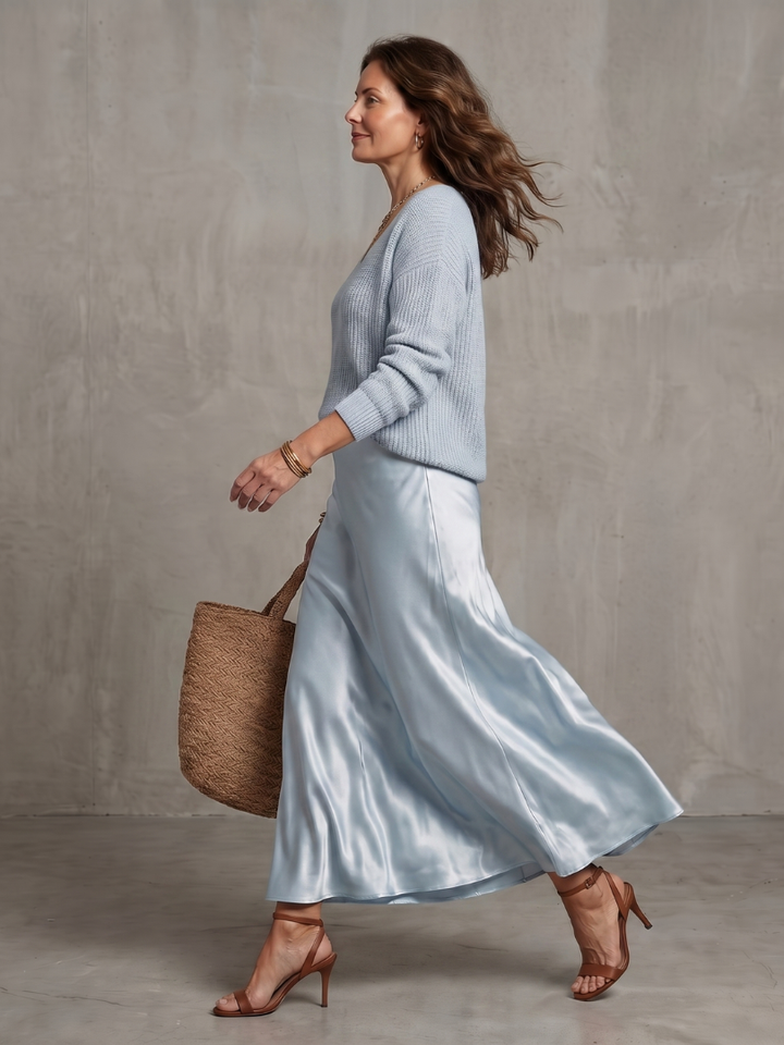 Side view of sweater and bias skirt