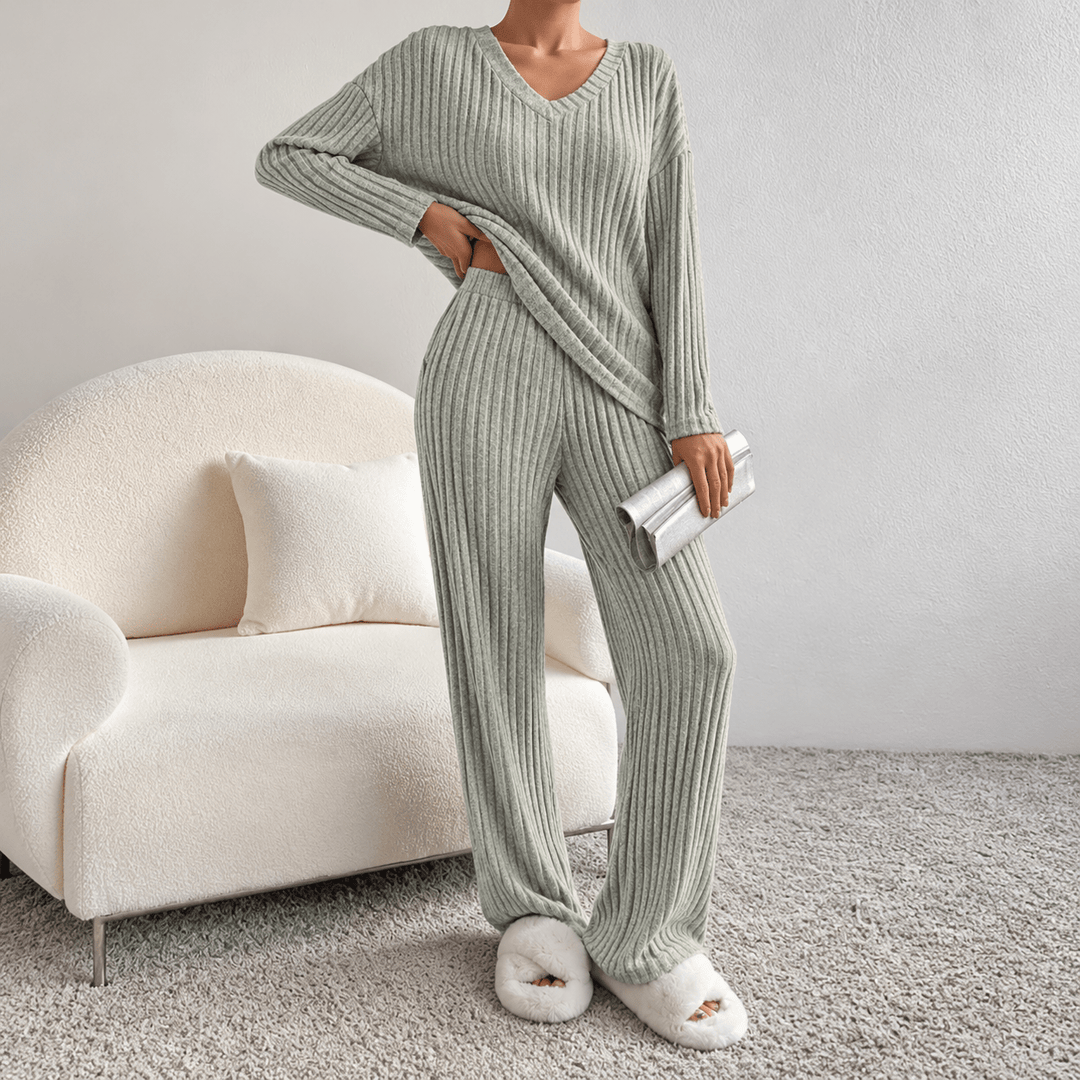 Front view showing v-neckline, long sleeves and wide legs, sage green