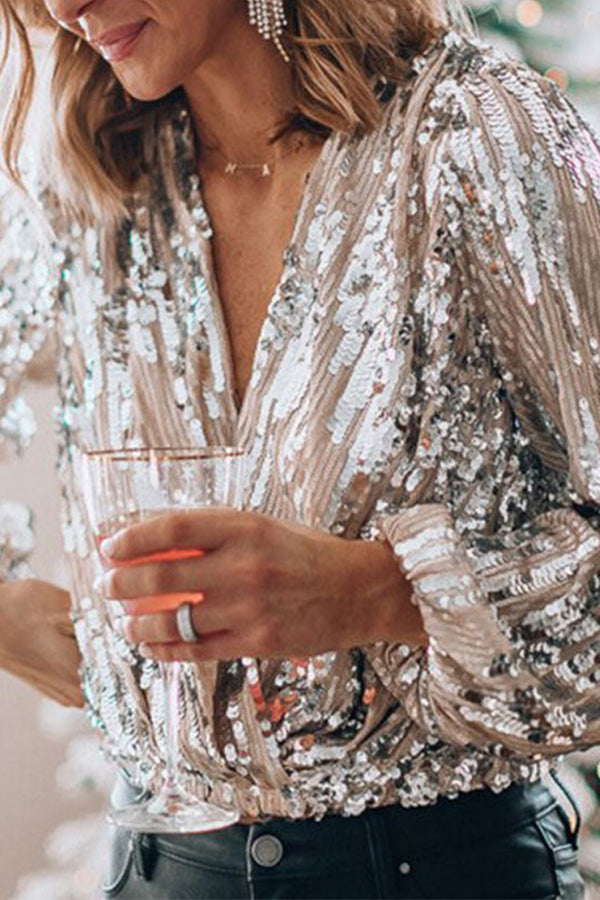 Front view of v-neckline and sequin bodice
